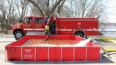 Fire truck behind an original Fol-Da-Tank folding tank
